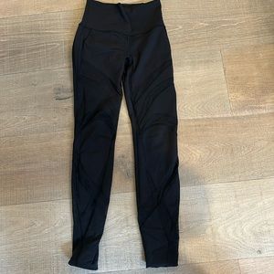 Black lululemon with black cut out  pattern